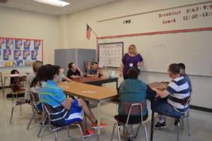 Speech Therapist leading class discussion.