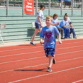 Student running on track.