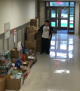 Student looking at donations.