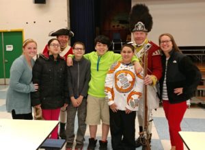 Students with Red Coat soldier