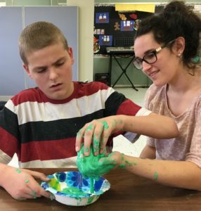 Student making slime.