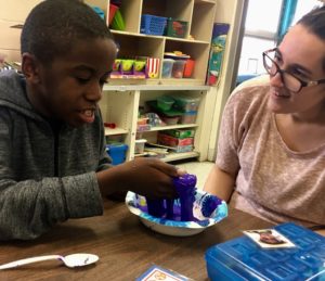 Student making slime.