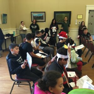 Students caroling at the Senior Center.