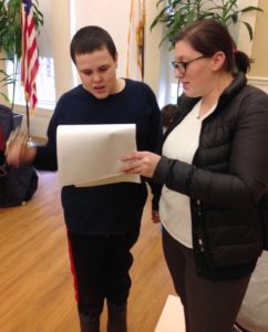 Students caroling at the Senior Center