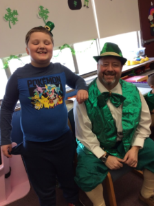 Leprechaun visit with students.