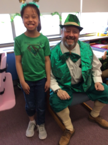 Leprechaun visit with students.