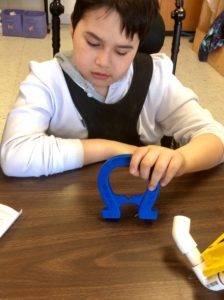 Learning about magnets.