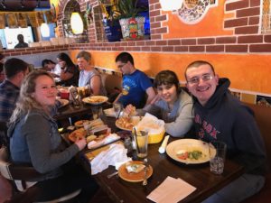 Eating Mexican food on Cinco de Mayo.