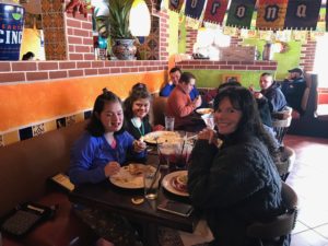 Eating Mexican food on Cinco de Mayo.